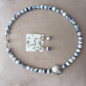 Rare white sodalite stone set